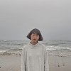 覃        馨
