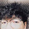 罗